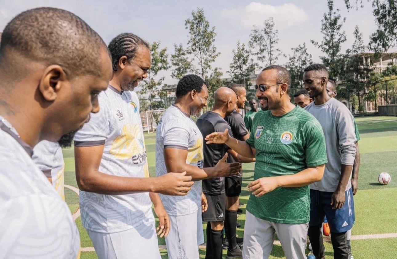 Ethiopian Prime Minister Abiy Ahmed greeting African football legends during the 2024 Ethiopia festival